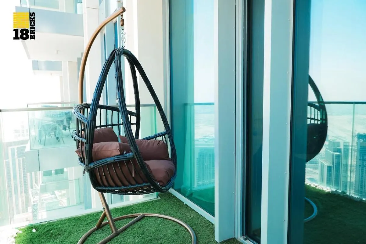 ドバイStylish 2Br With Panoramic Creekside Viewsアパートメント アラブ首長国連邦